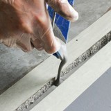 Vloerreparatie voor betonvloeren, vloeibaar plamuur